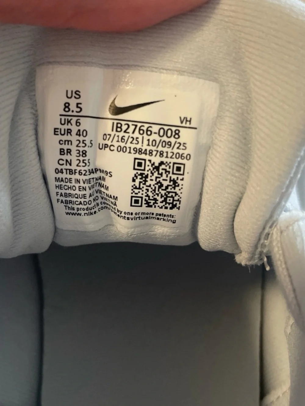Nike White and Light Gray Sneakers with Subtle Black Swoosh